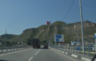 КЧР. Накопительные ёмкости и указатель На Домбай и Архыз.