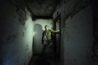Возле выхода.