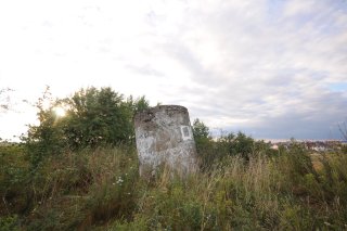 Оголовок вентшахты в роще.