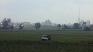 Грузовик на фоне Девятовки.